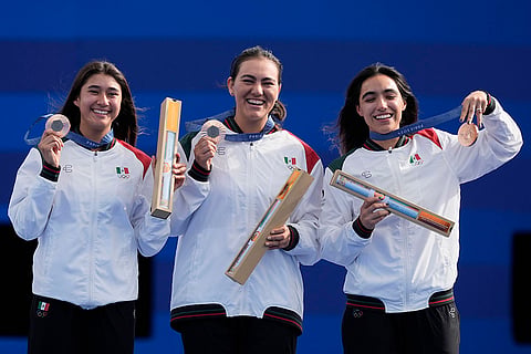 Archery women's team medal ceremony: Bronze medal winners, Angela Ruiz, left, Alejandra Valencia, center, and Ana Vazquez